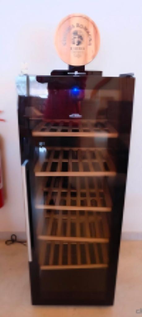 Frigo à vin impeccable, Enlèvement