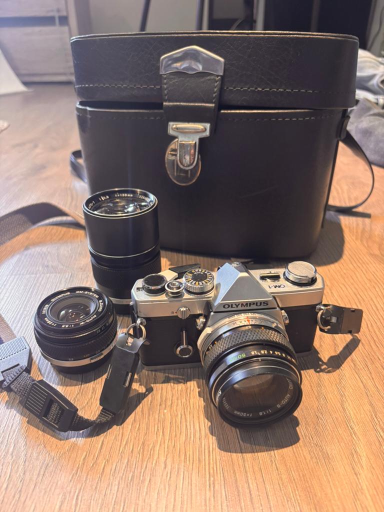 Olympus om-1 met 3 lenzen, Audio, Tv en Foto, Fotocamera's Analoog, Ophalen of Verzenden, Zo goed als nieuw, Olympus