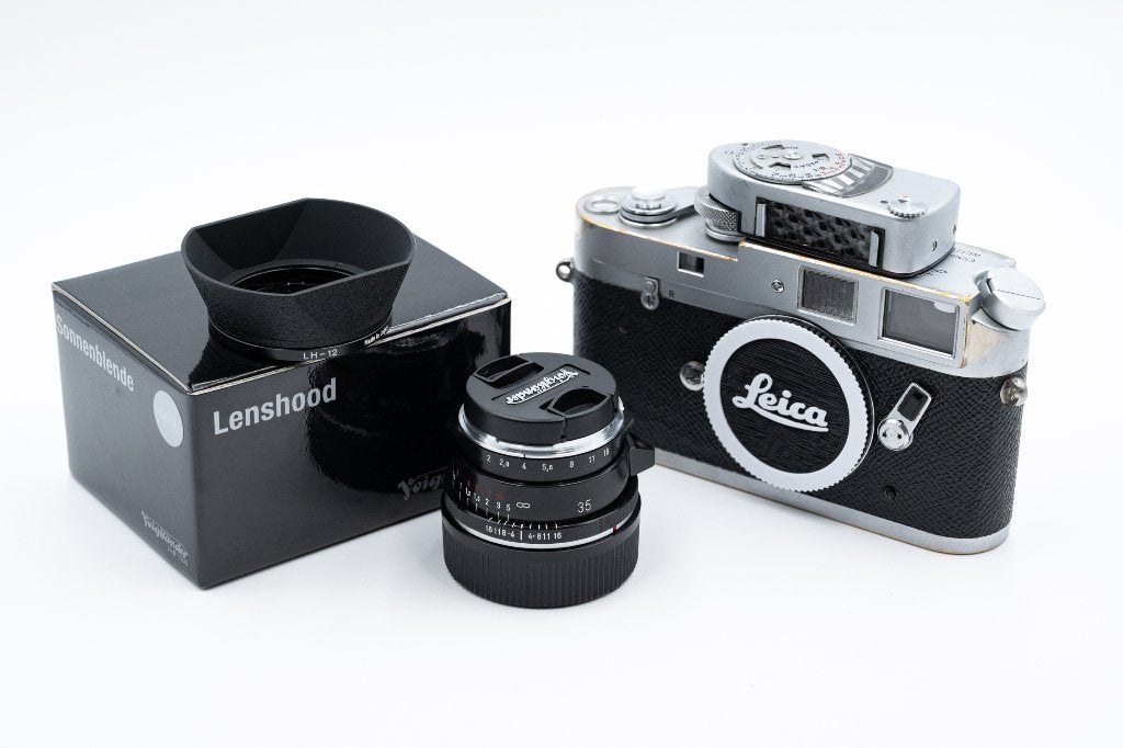 Leica M4 + Voigtländer 35 mm f/2 Ultron VM II + Extra's, Audio, Tv en Foto, Fotocamera's Analoog, Compact, Leica, Ophalen of Verzenden