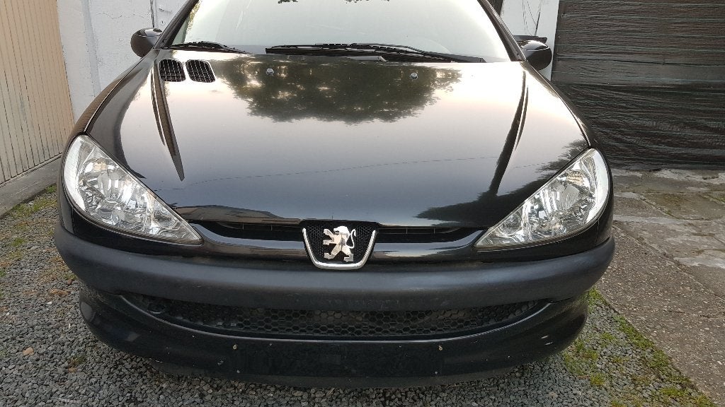 peugeot 206 1.4i essence 10/2008  161 000km, Auto's, Voorwielaandrijving, 4 cilinders, Zwart, Particulier