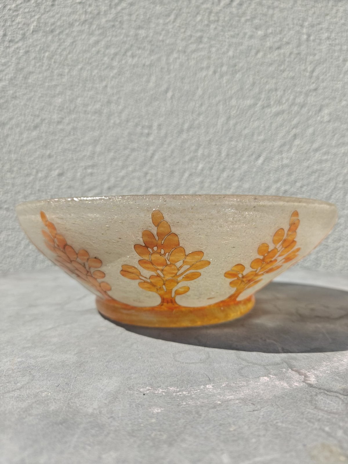 Uitgewerkte kom van le verre francais, Ophalen