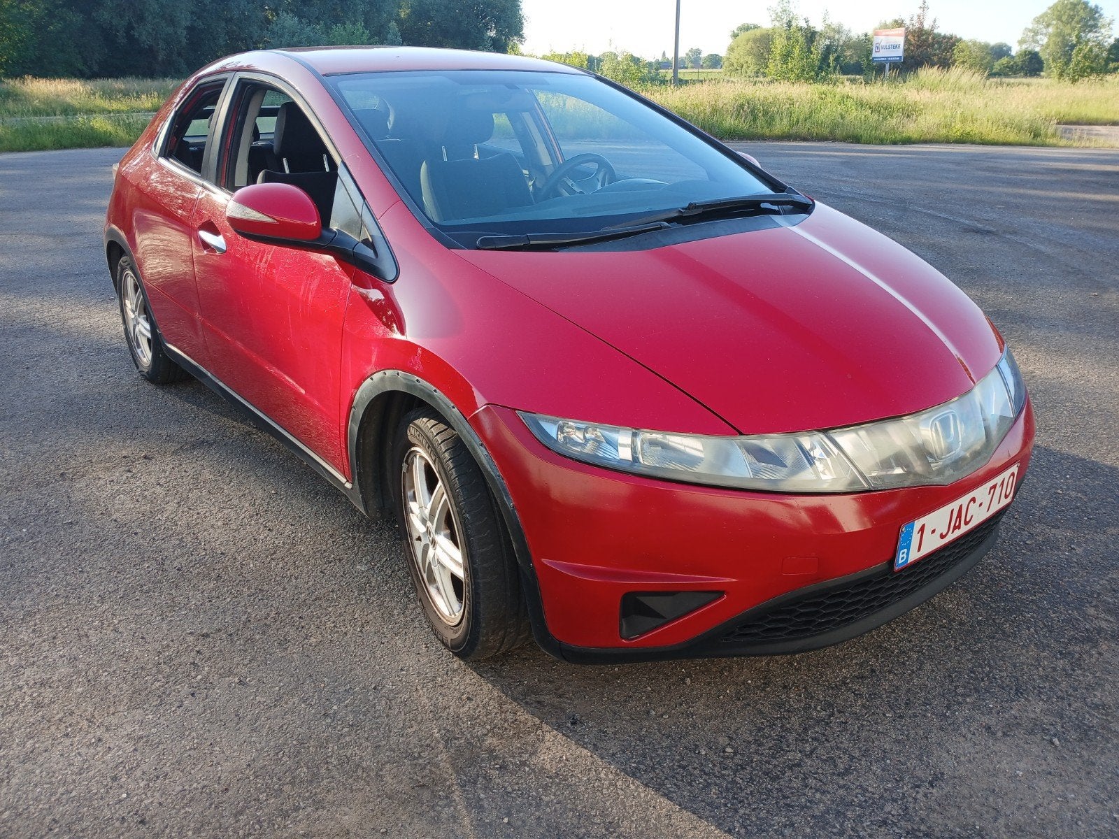 Civic 1.4 benzine 2006, Auto's, Honda, Particulier, Civic, Benzine, Euro 4, 5 deurs, Handgeschakeld, Rood, Stof, Voorwielaandrijving