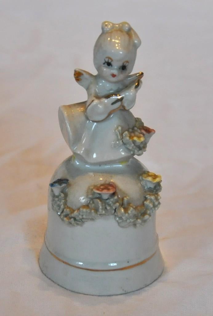 clochette en porcelaine poignée ange violoniste, Enlèvement ou Envoi