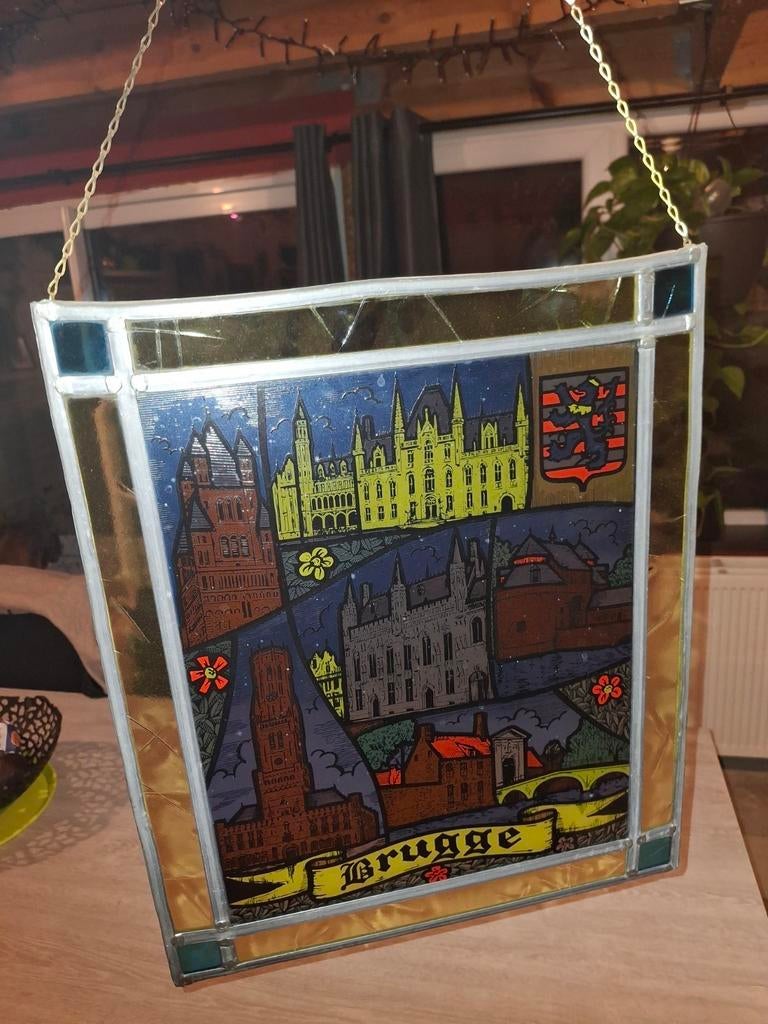 Glasraam in lood Brugge, Ophalen