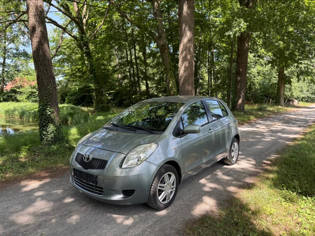 Toyota Yaris - 1.0 Benzine - Garantie 2 Jaar, Auto's, Voorwielaandrijving, Testrit aan huis, Stof, Zwart