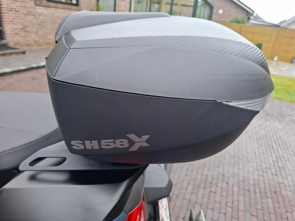 Top koffer Shad 58x, Ophalen