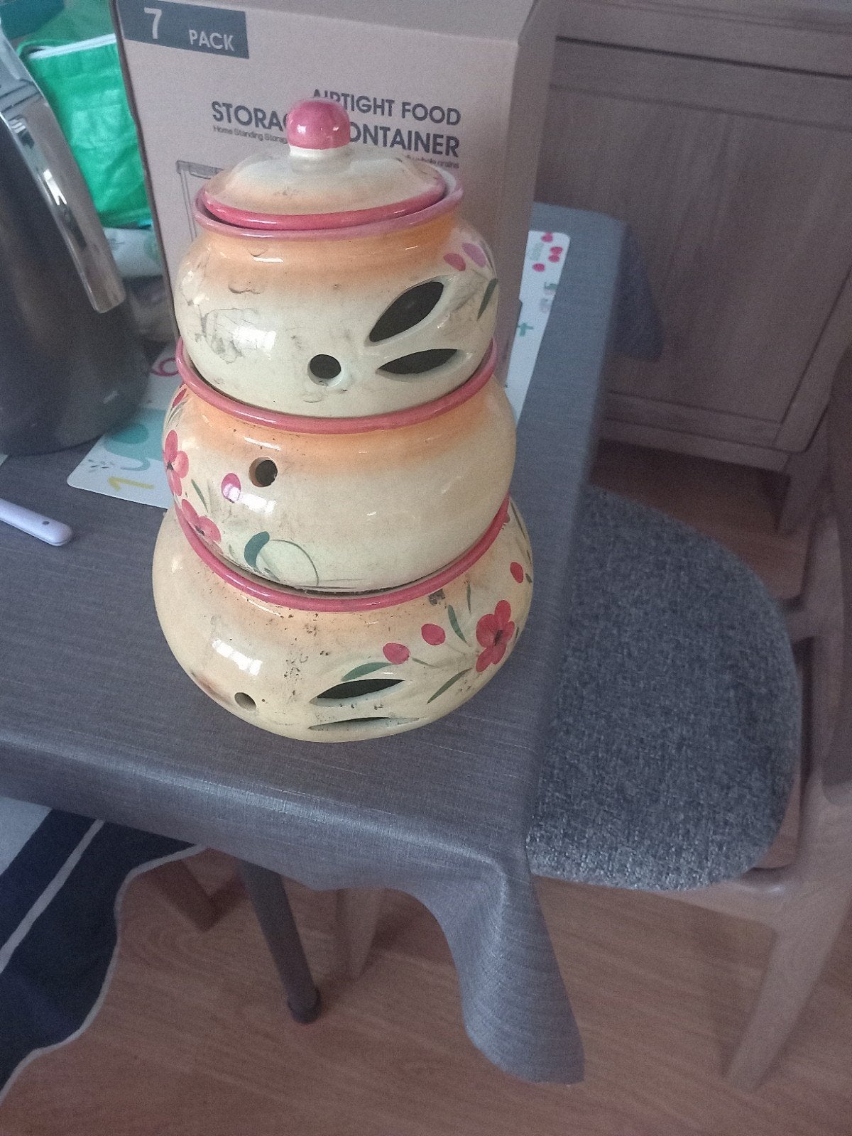 Zeer goed ajuin pot en look pot, Ophalen