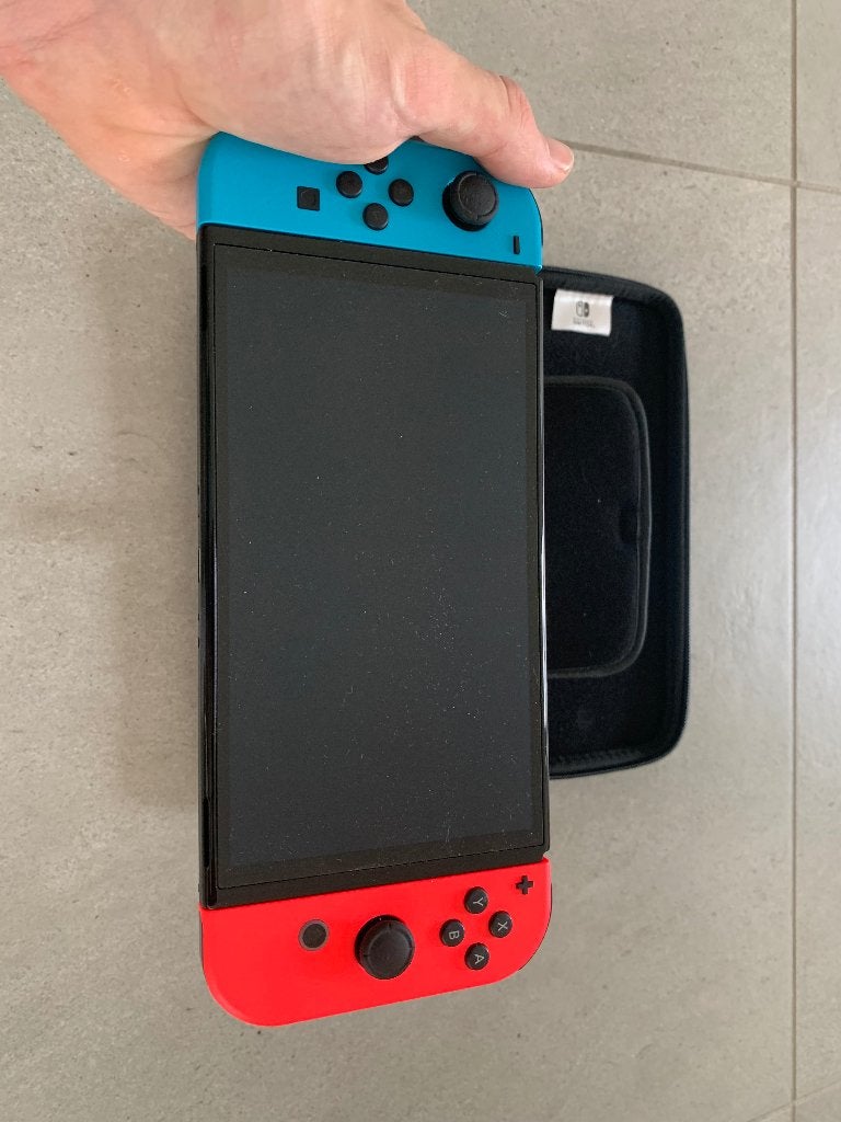 Nintendo Switch (OLED model) Blauw, Rood, Games en Spelcomputers, Spelcomputers | Nintendo Switch, Ophalen of Verzenden, Zo goed als nieuw