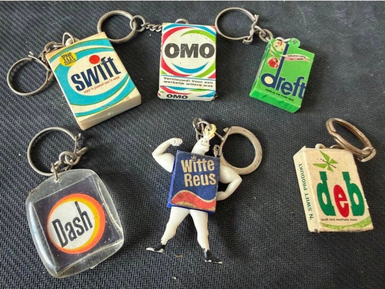 Wow! 1960/1970 wasmiddelen 6 sleutelhangers o.a. Dreft, Omo, Envoi, Comme neuf, Marque