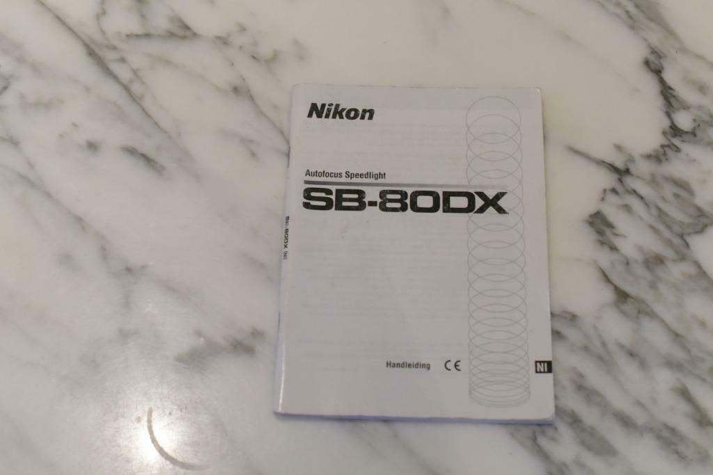 Nikon SB-80DX handleiding, Ophalen of Verzenden, Zo goed als nieuw, Nikon, Kantelbaar