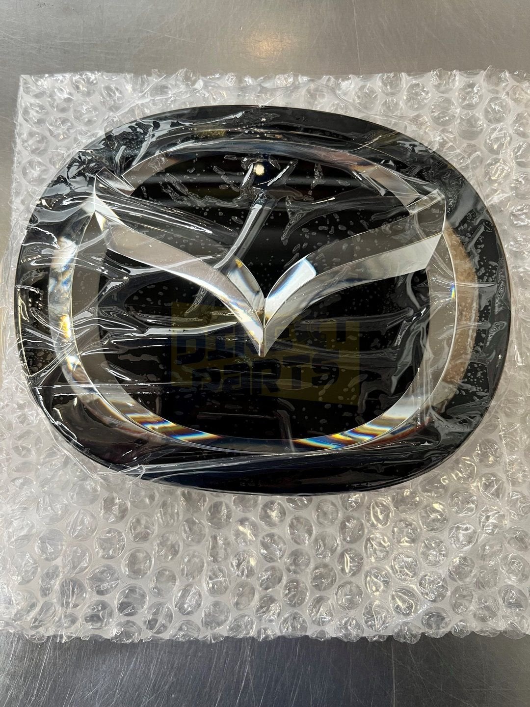 Mazda CX-3 grille embleem logo ''Mazda'' (Bij ACC) Origineel, Autos : Pièces & Accessoires, Neuf, -, -, Mazda