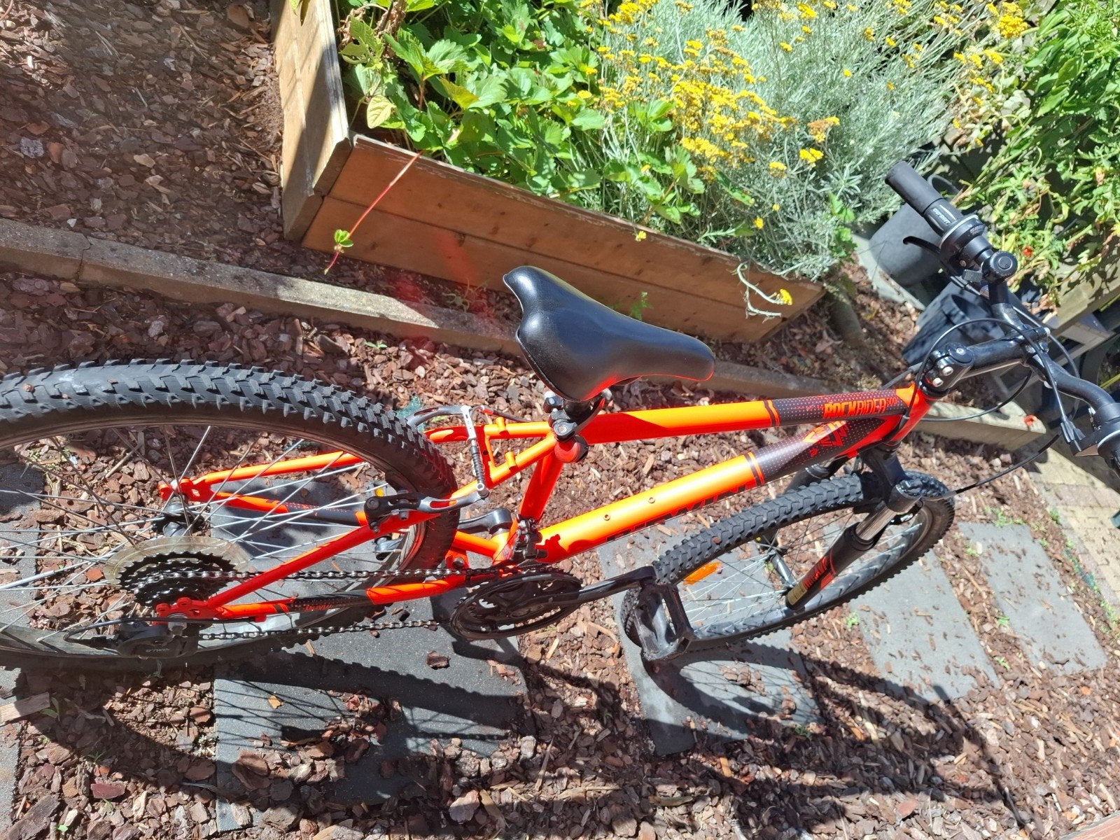 Oranje Rockrider kinderfiets, Ophalen, 20 inch of meer, Gebruikt, Velgrem