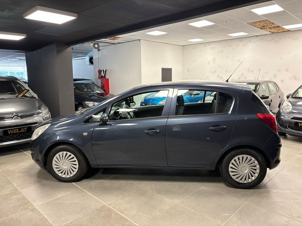 OPEL CORSA 1.2 LITER BENZINE/2010/TOP STAAT, Auto's, Bluetooth, Bedrijf, 1200 cc, Zilver of Grijs