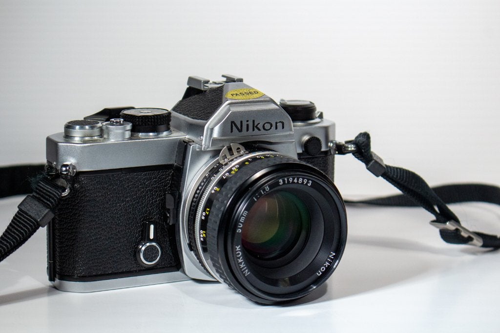 NIKON FM +nikkor 50mm f1..8 état et fonctionnementimpeccable, TV, Hi-fi & Vidéo, Enlèvement, Comme neuf, Reflex miroir, Nikon