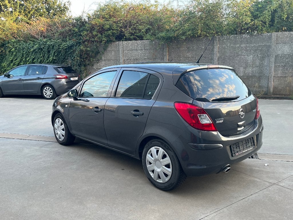 Opel Corsa 1.2 benzine 2011 met 93000km*EURO 5*LEZ OK*, Euro 5, Stof, 4 cilinders, Sound system