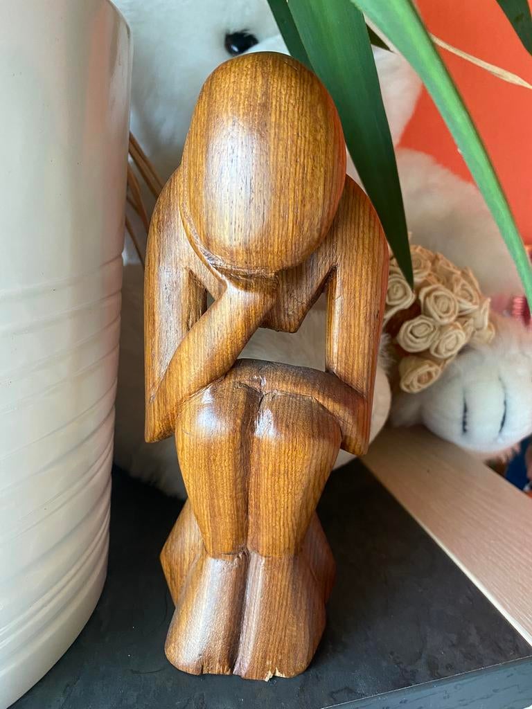 Houten beeldje, Ophalen