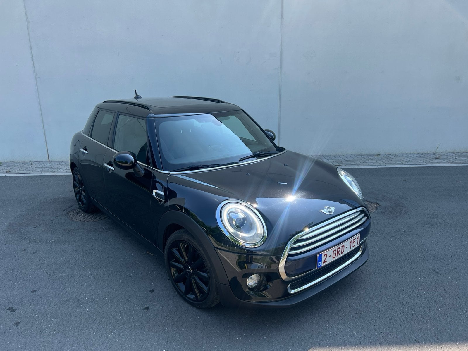Mini one 2016, Auto's, Voorwielaandrijving, Panoramadak, Leder en Stof, Zwart