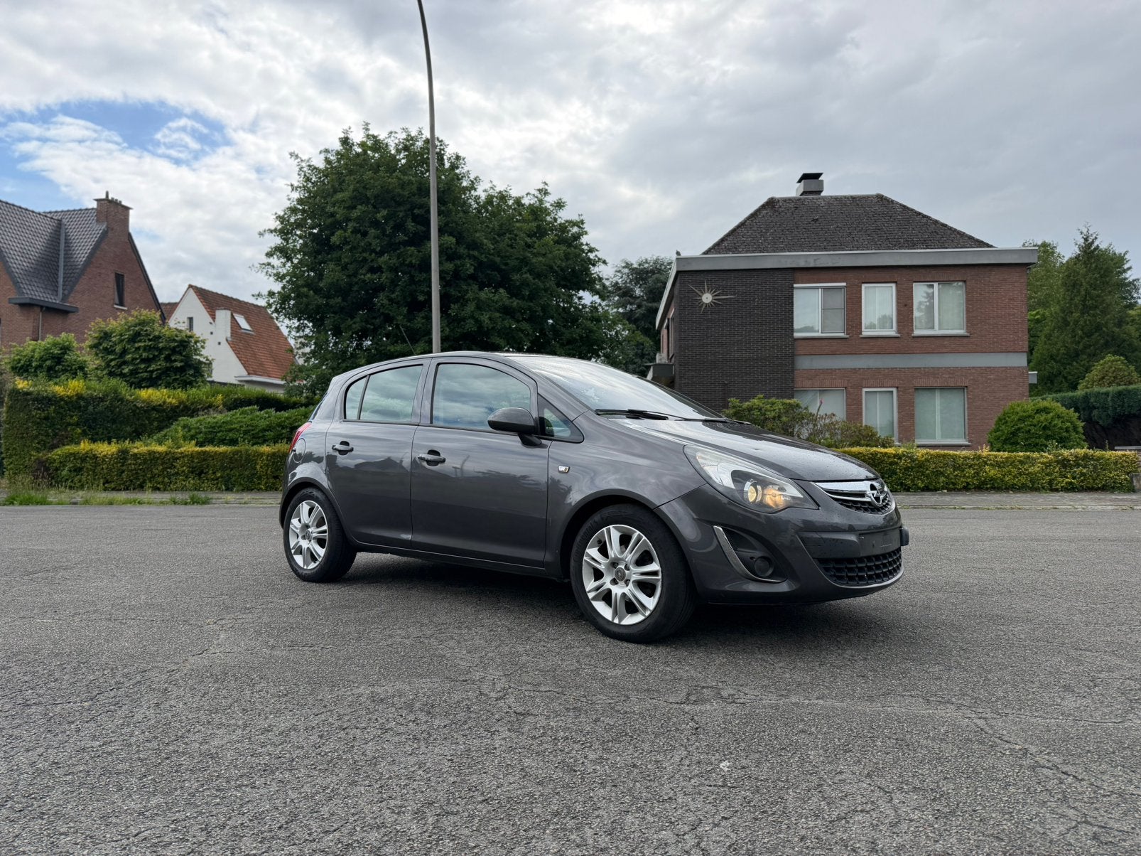 Opel Corsa 2012 met 93 ooo km 1.2 benzine euro 5 GEKEURD, Voorwielaandrijving, Euro 5, Leder en Stof, Corsa