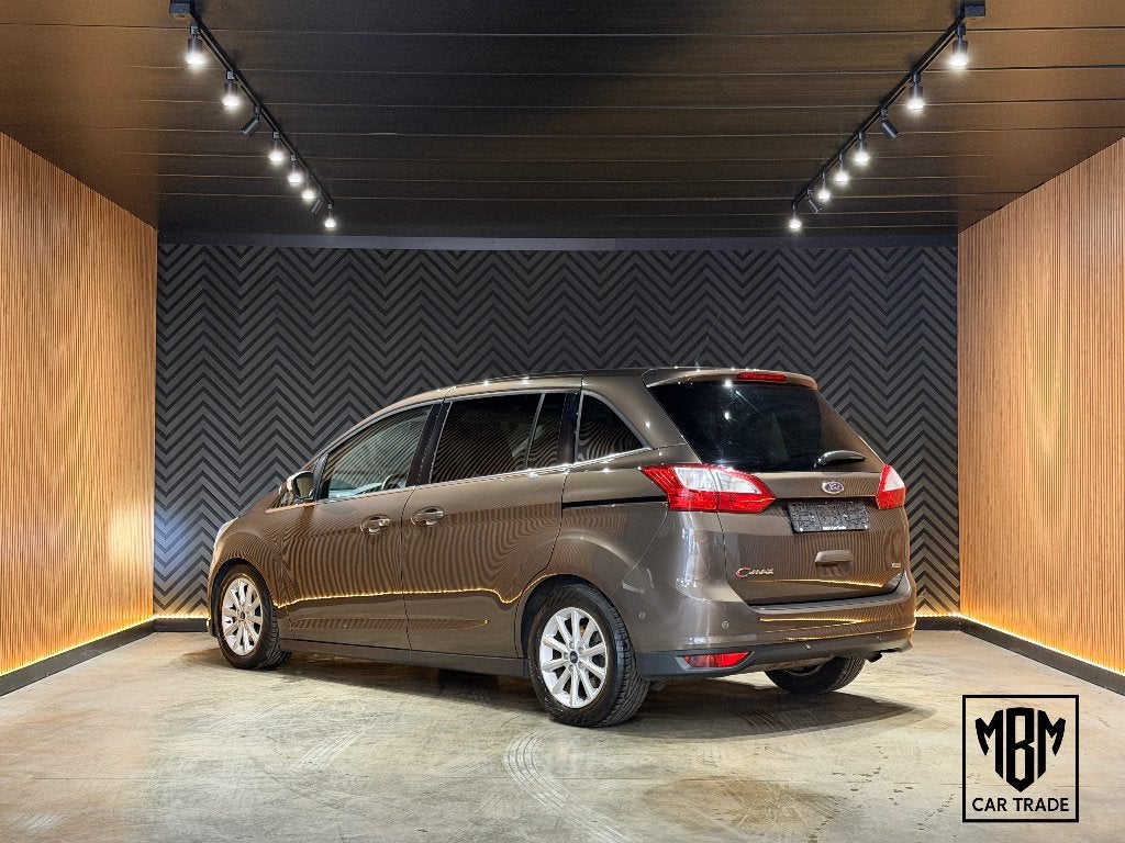 ✅Ford Grand C-Max 1.5 EcoBoost GARANTIE Navi Leer Z.verw PDC, Auto's, Dealer onderhouden, Monovolume, 1498 cc, 4 cilinders
