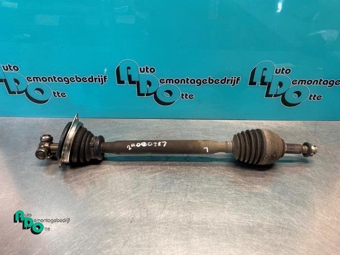Arbre de transmission avant gauche d'un Dacia Sandero (Sande, Dacia, -, 3 mois de garantie, Utilisé