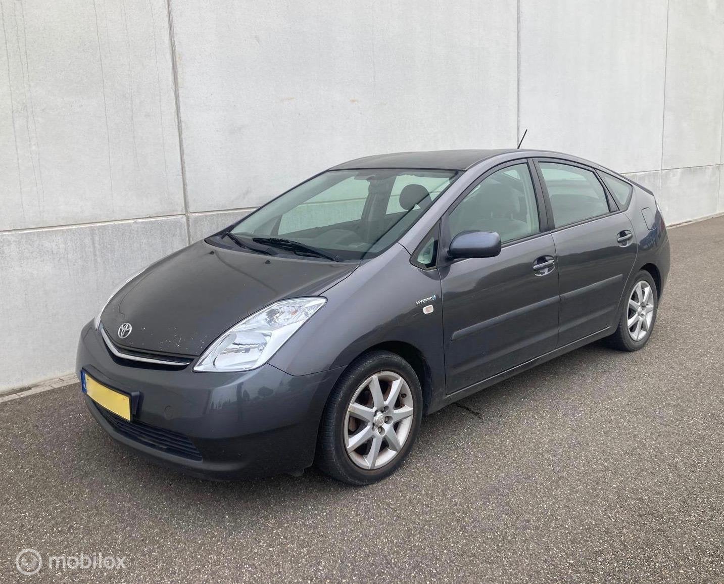 Toyota Prius 1.5 VVT-i Comfort HYBRIDE AUTOMAAT 1e EIGENAAR, Autos, 57 kW, Argent ou Gris, Achat, Carnet d'entretien