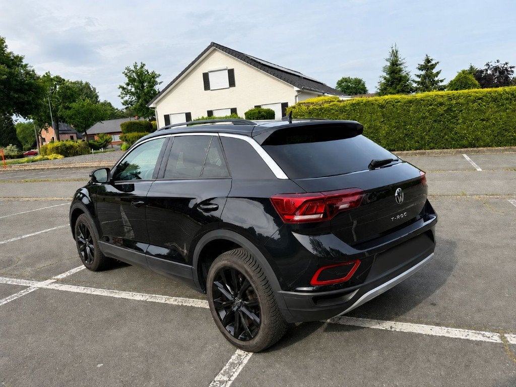 Volkswagen T-Roc 1.5 TSI DSG 150pk | 2024, Auto's, Stof, 1498 cc, Zwart, 5 zetels