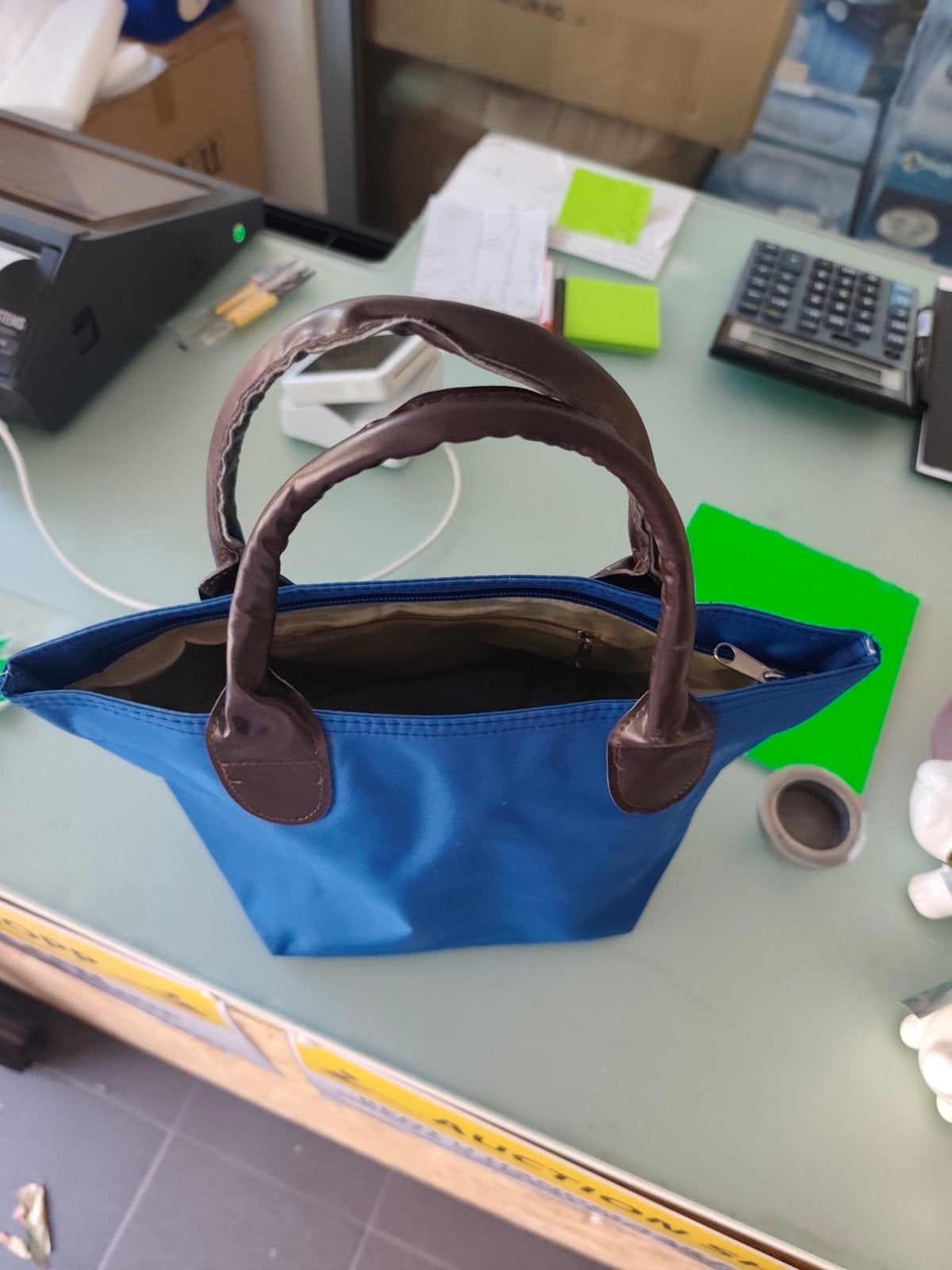 Lot kleine handtasjes, Ophalen