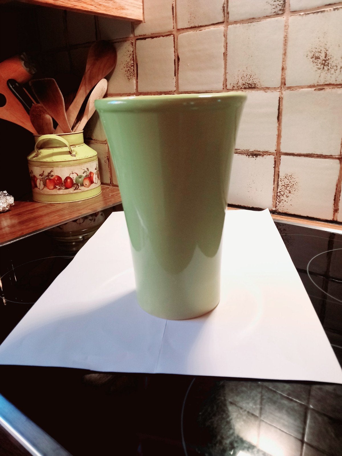 Mintgroene vaas, Ophalen