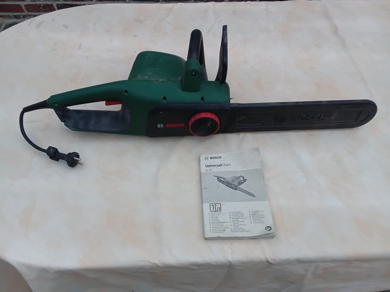 Tronçonneuse Bosch UniversalChain 40, Bricolage & Construction, Tronçonneuse, 1200 watts ou plus, 30 à 70 mm, Enlèvement