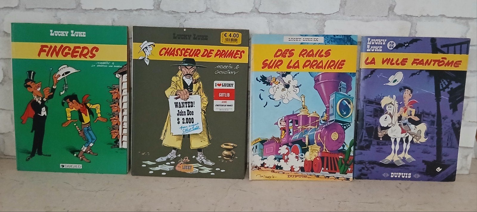 Lot de 4 BD Lucky Luke 1977 - 1983 - 2009, Livres