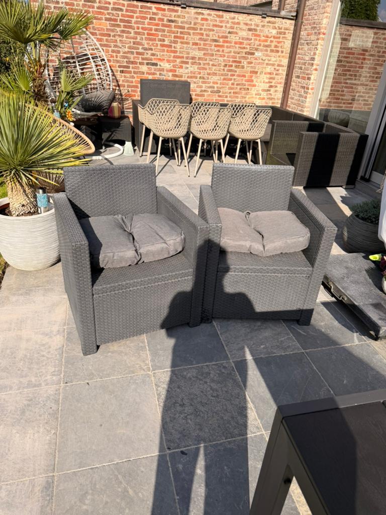 2 stevige tuinstoelen in wicker/rotan look met zitkussens., Ophalen, Zo goed als nieuw, Rotan