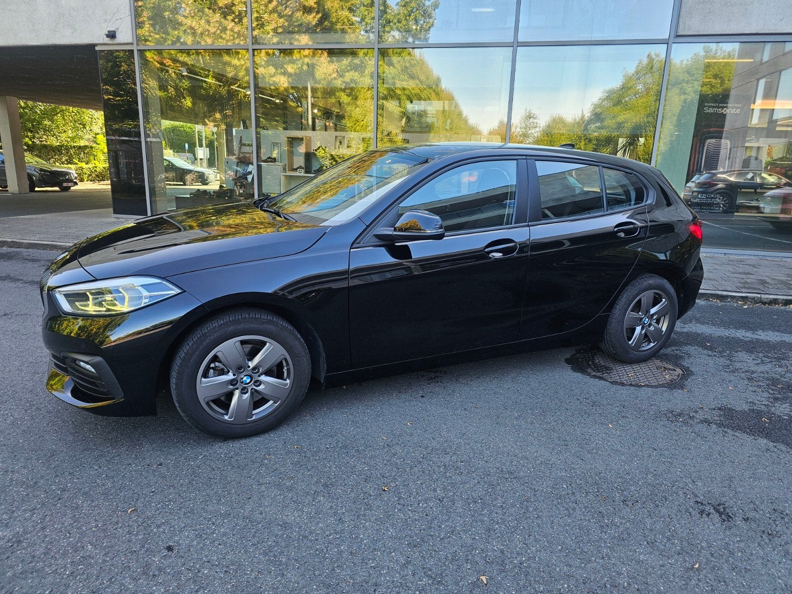 BMW 118iA benzine automaat, Auto's, Dealer onderhouden, 1498 cc, Euro 6, Zwart
