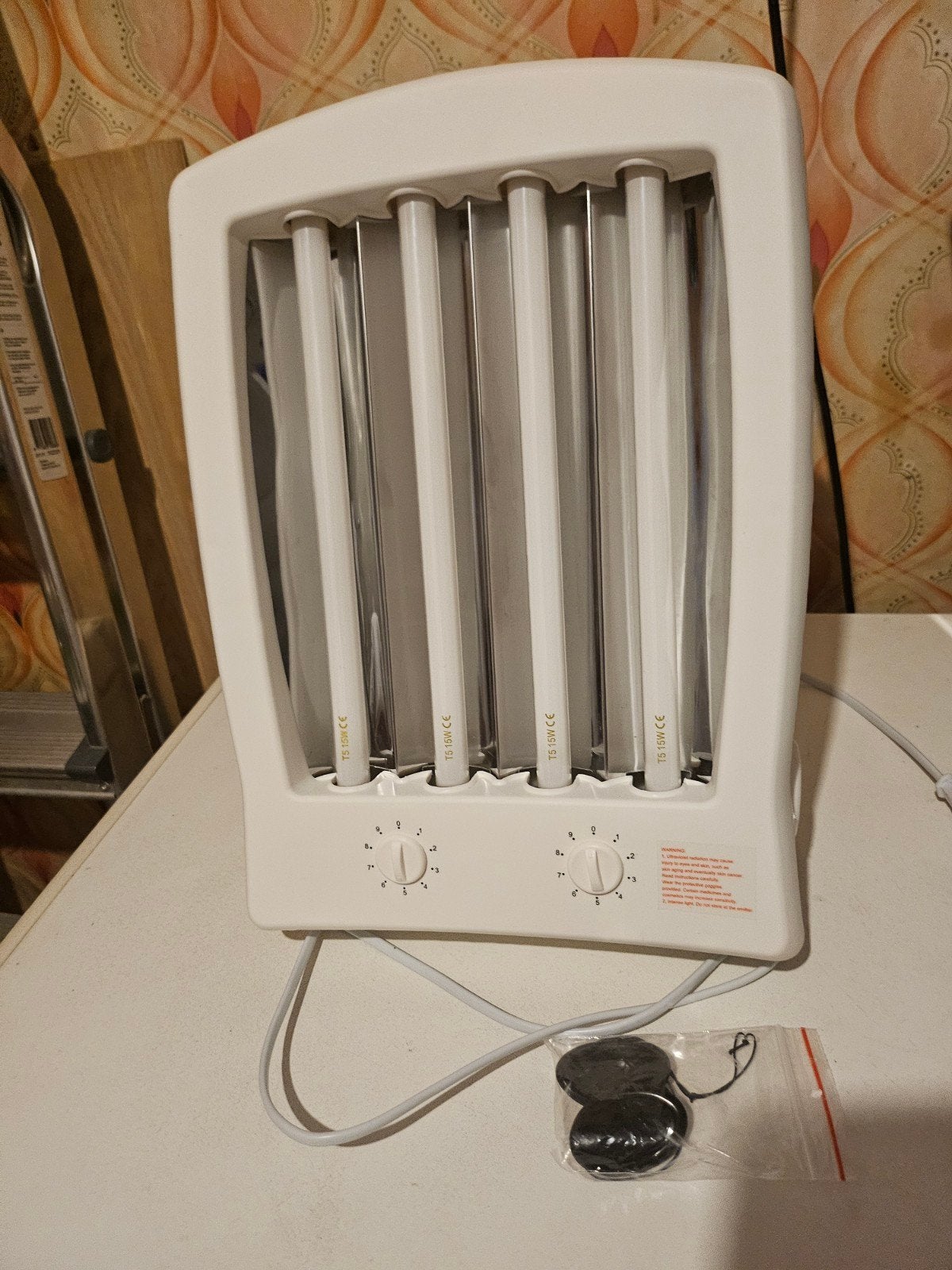Zonnebank voor gezicht, Ophalen
