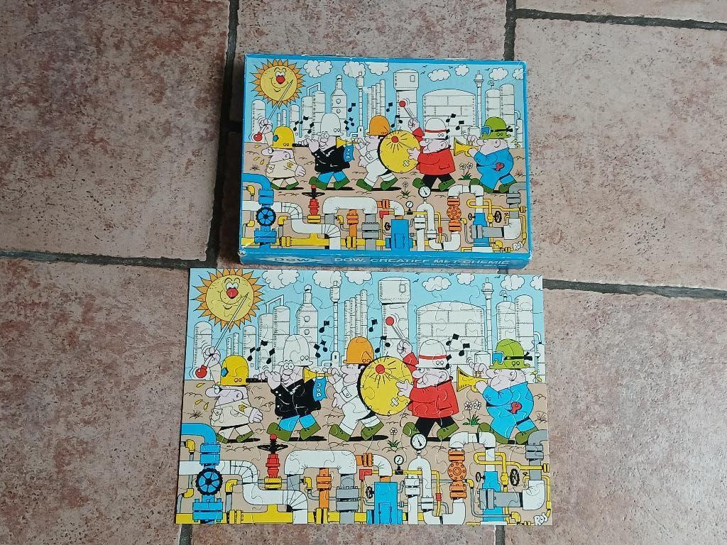 Puzzle rare de Jan van Haasteren - DOW Chemical (70 pièces), Enlèvement, Plus de 50 pièces, Comme neuf
