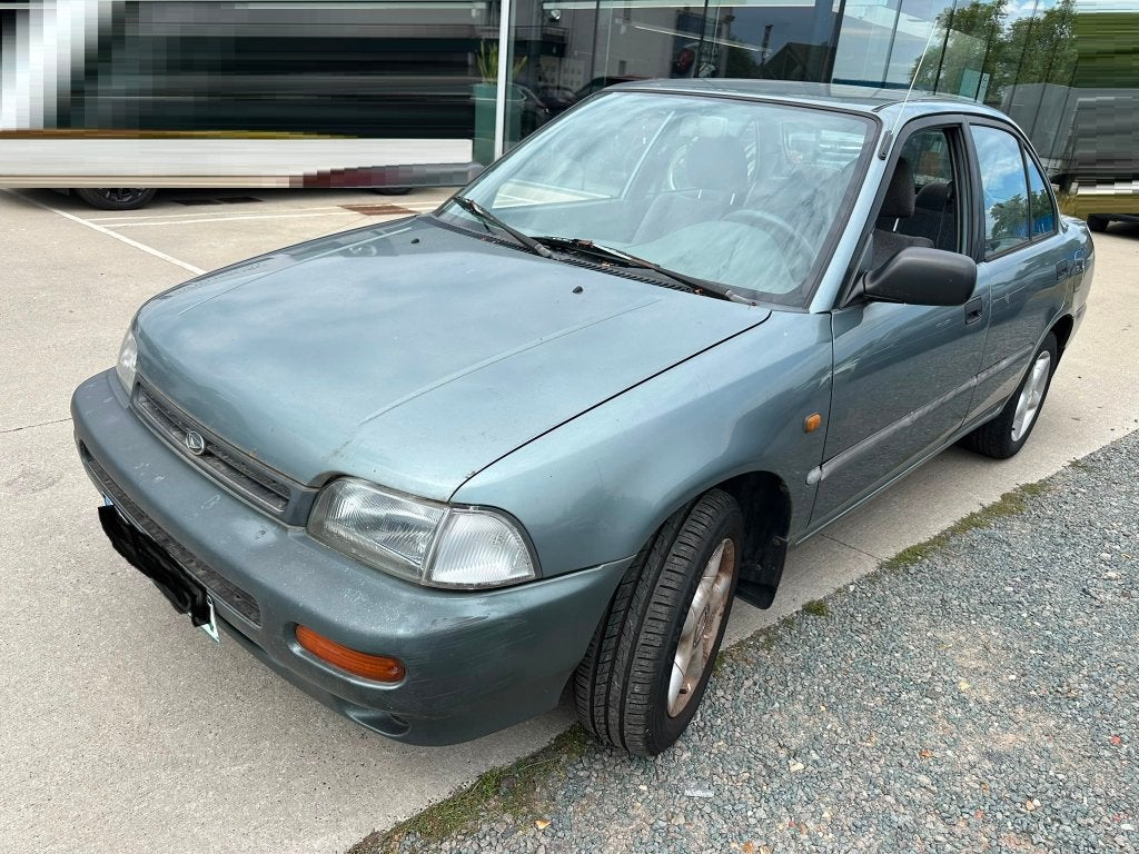 Daihatsu Charada 1.5Benzine Manual 1994, Auto's, Daihatsu, Voorwielaandrijving, Stof, Particulier, Zilver of Grijs