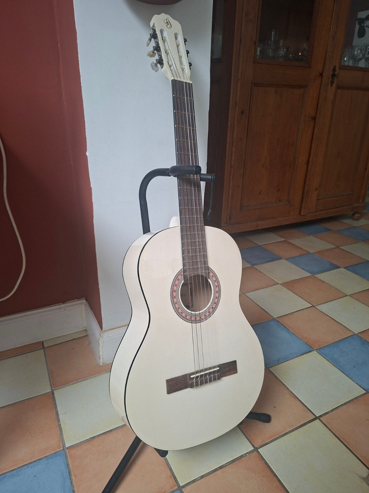 Gitaar met staander, Ophalen