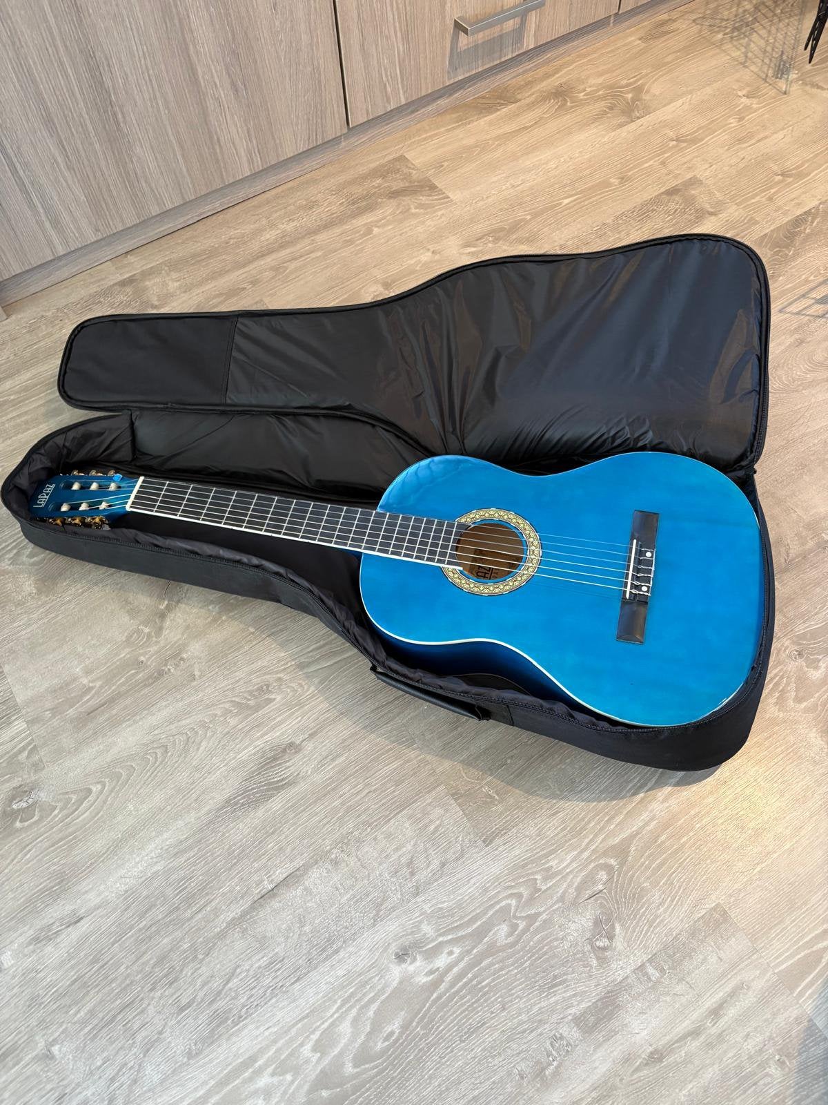 Gitaar, Ophalen, Zo goed als nieuw
