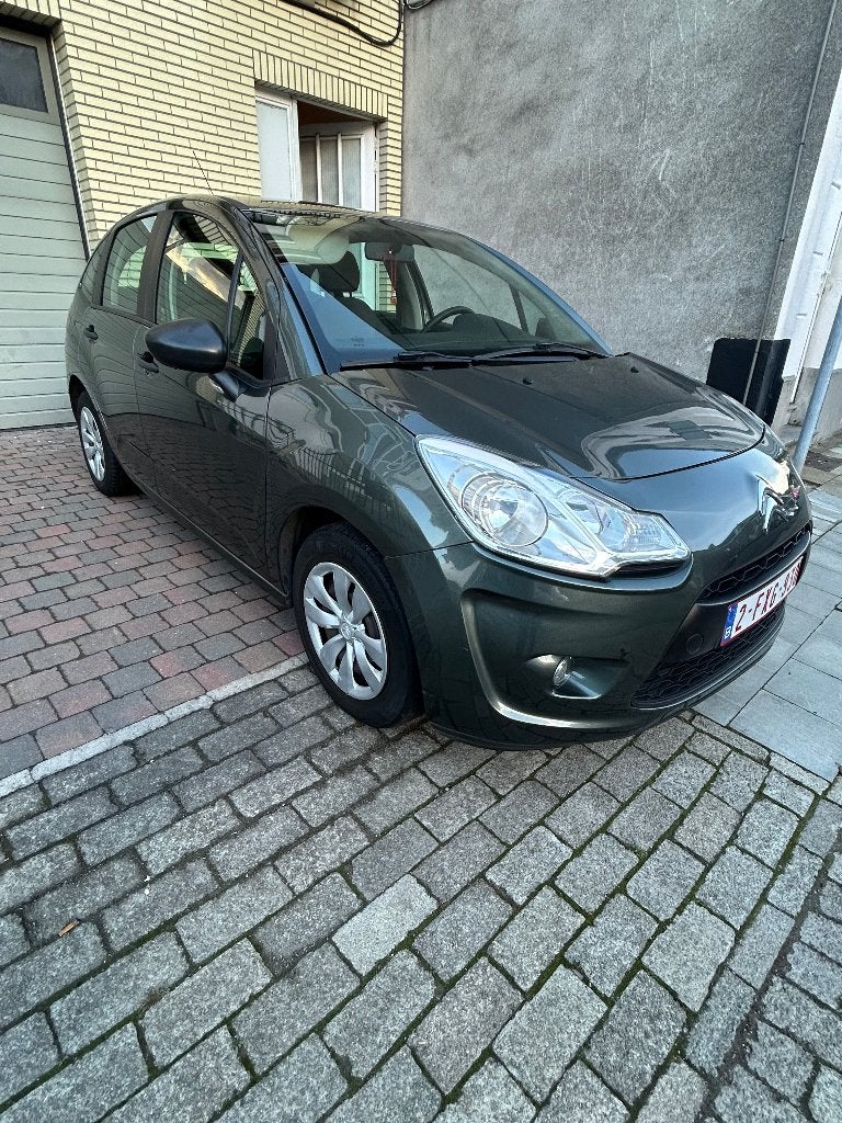 Citroën C3 essence 2012 1.1, Auto's, Voorwielaandrijving, Euro 5, Zwart, Leder en Stof
