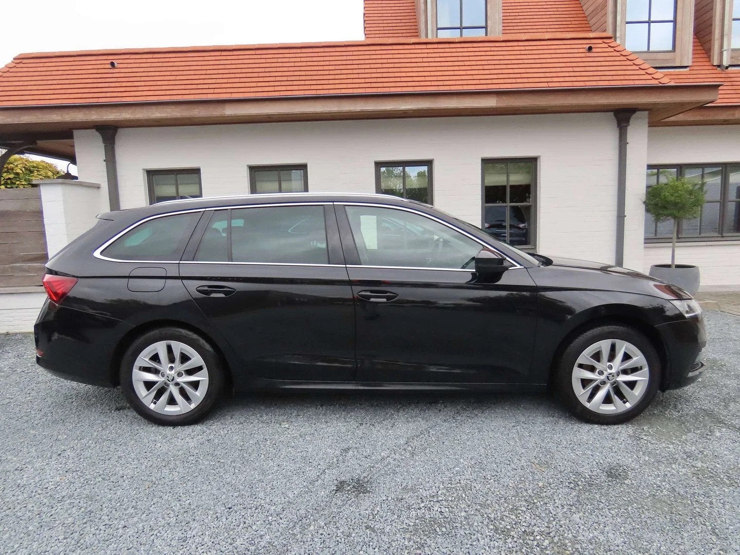 Skoda Octavia Octavia SW 1.0 TSI Ambition (bj 2021), Auto's, Gebruikt, Euro 6, Zwart, 5 deurs