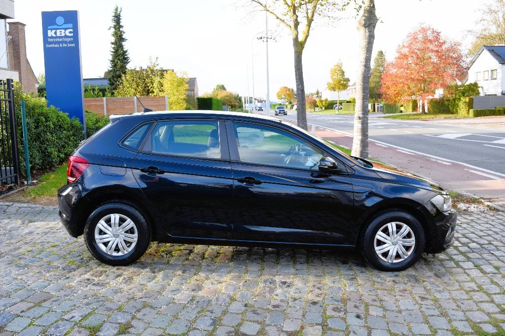 Vw Polo 1.0i/GPS/CarPlay/HISTORY/GARANTIE, Auto's, Voorwielaandrijving, Stof, Zwart, Bedrijf