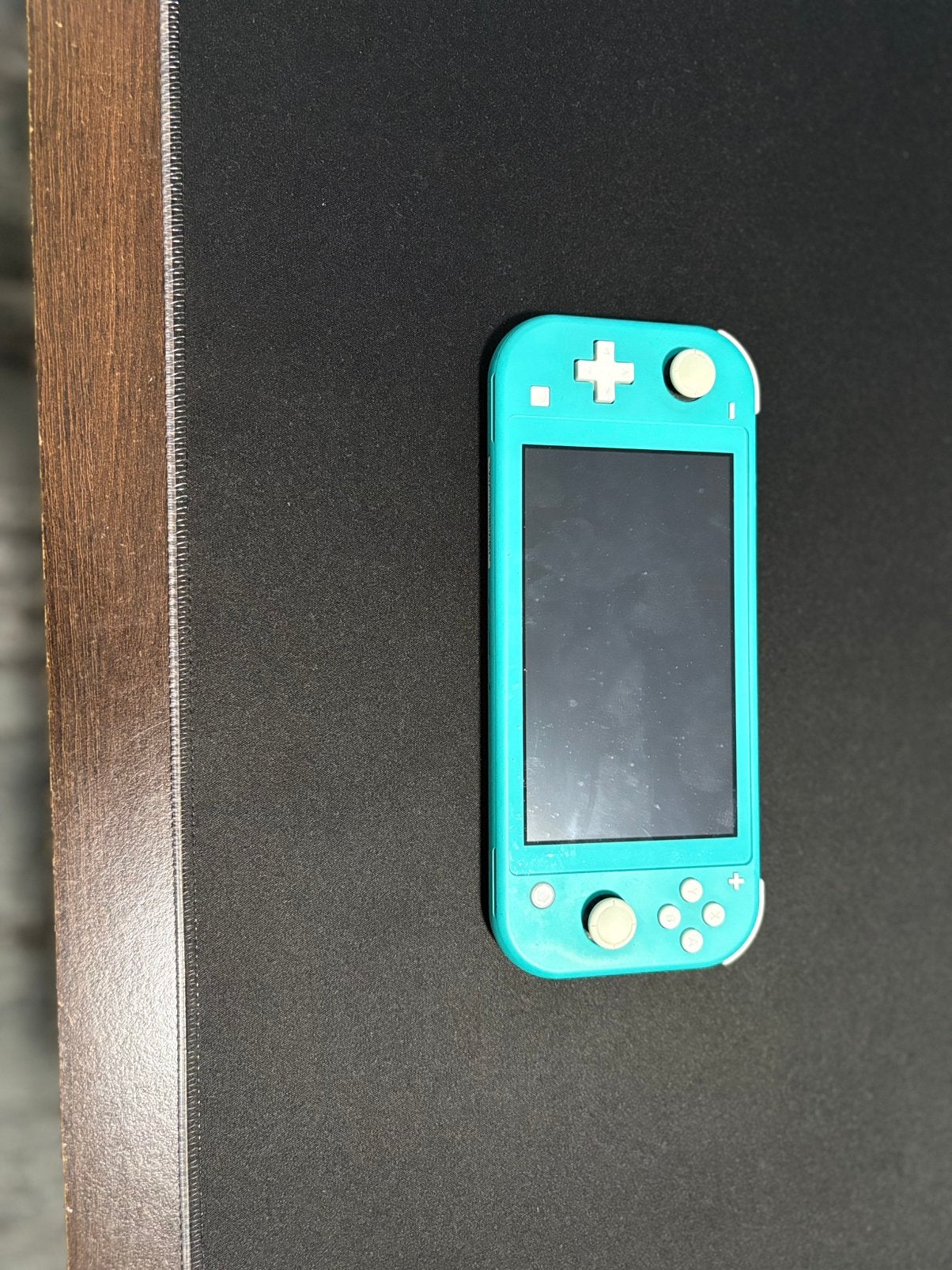 Switch lite bleu, Enlèvement, Turquoise, Comme neuf, Avec housse de protection ou sac