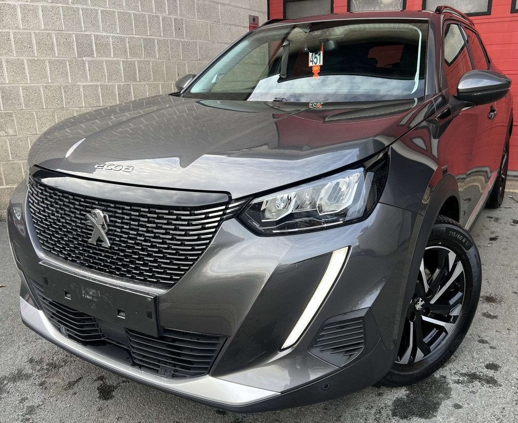 Peugeot 2008 1.2 PureTech Allure S + CAMÉRA + NAVI + CUIR, Auto's, Gebruikt, 1199 cc, Leder, Bedrijf
