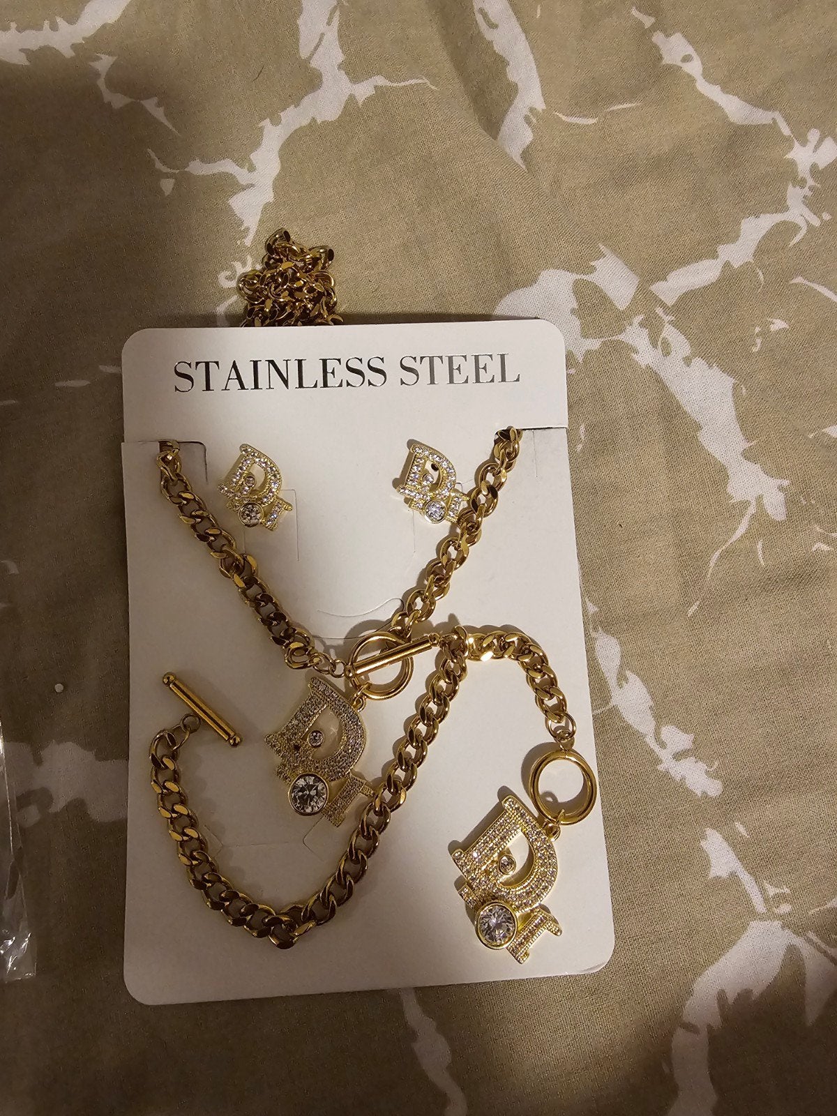 Gouden sieradenset RVS – ketting, armband & oorbellen, Verzenden, Nieuw, Goud, Staal