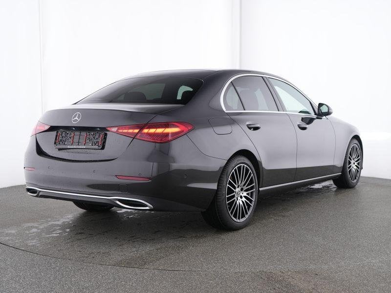 Mercedes-Benz C-klasse 180 Berline Luxury Line | Panoramisch, Auto's, Automaat, 4 deurs, Zwart, 4 cilinders