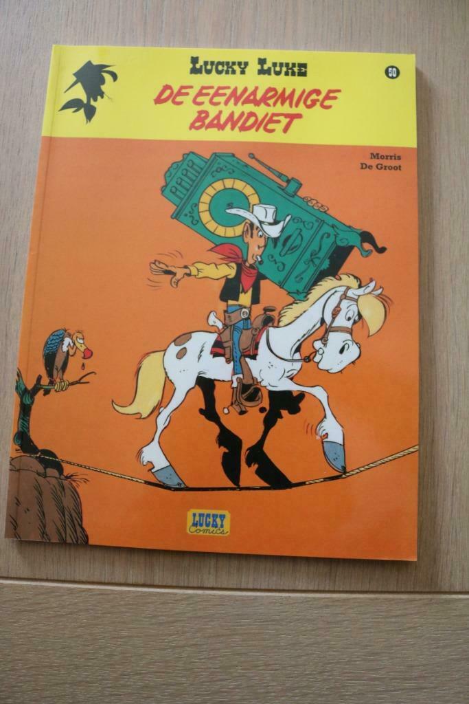Lucky Luke 50 : De eenarmige bandiet 1e druk heruitgave 2016, Boeken, Eén stripboek, Ophalen of Verzenden, Nieuw