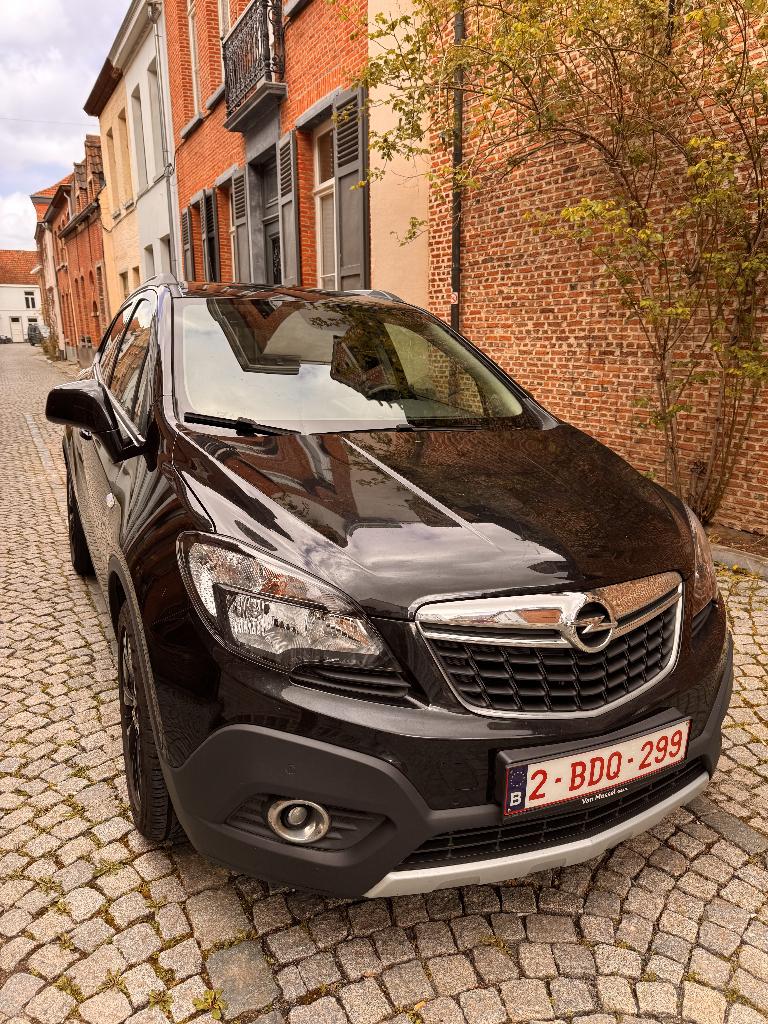 Opel Mokka 1.4 Turbo benzine | Bouwjaar 2016, Auto's, Opel, Parkeersensor, 1350 kg, Zwart, Leder