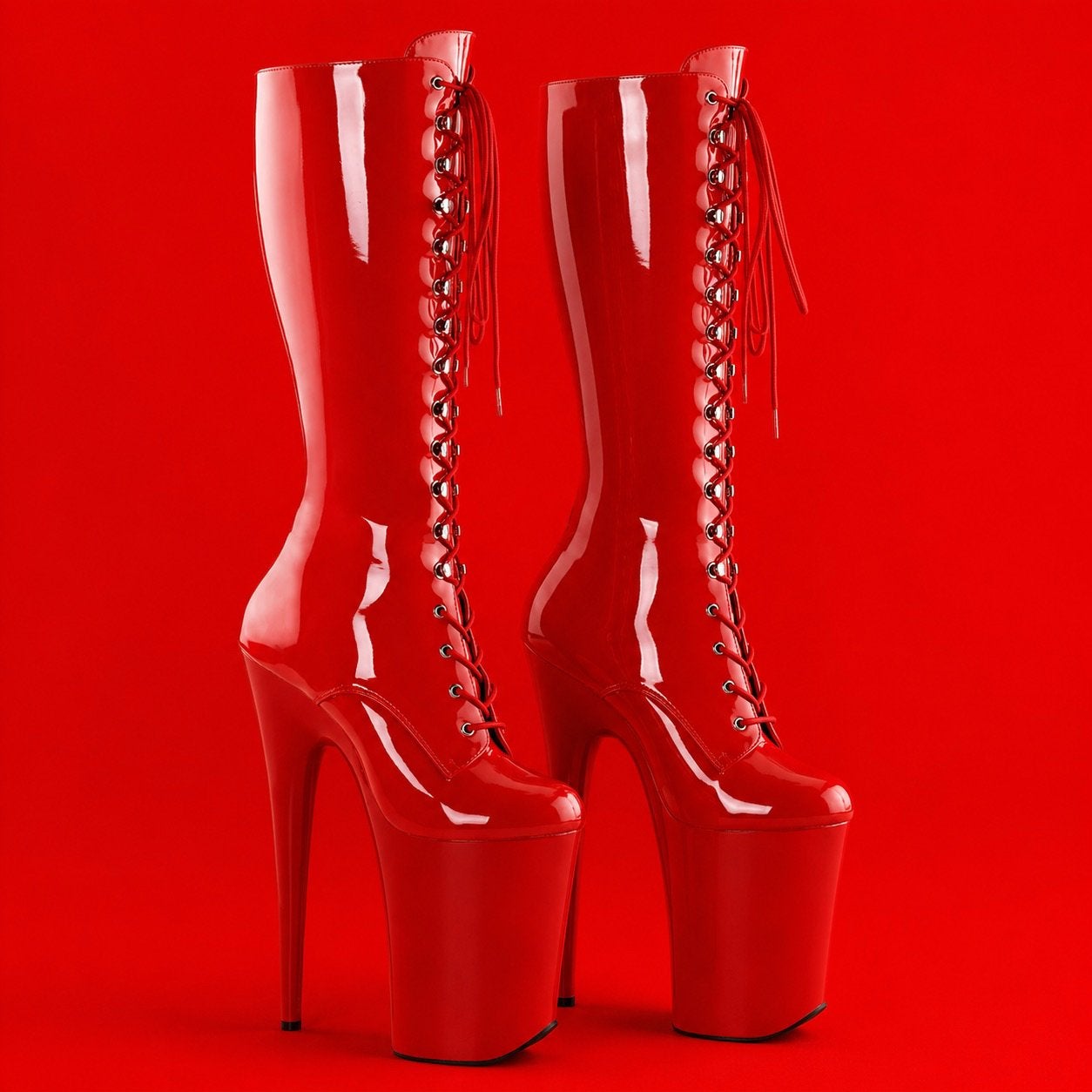 Bottes plateforme rouges vernies talons extrêmes – Taille 42, Enlèvement, Comme neuf, Rouge, Bottes hautes