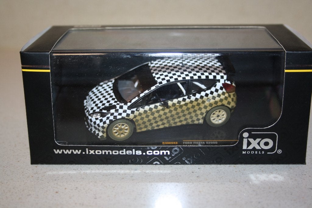 IXO 1:43 Ford Fiesta S2000 Test Car Wilson rally 2009., Ophalen of Verzenden, Nieuw, Auto