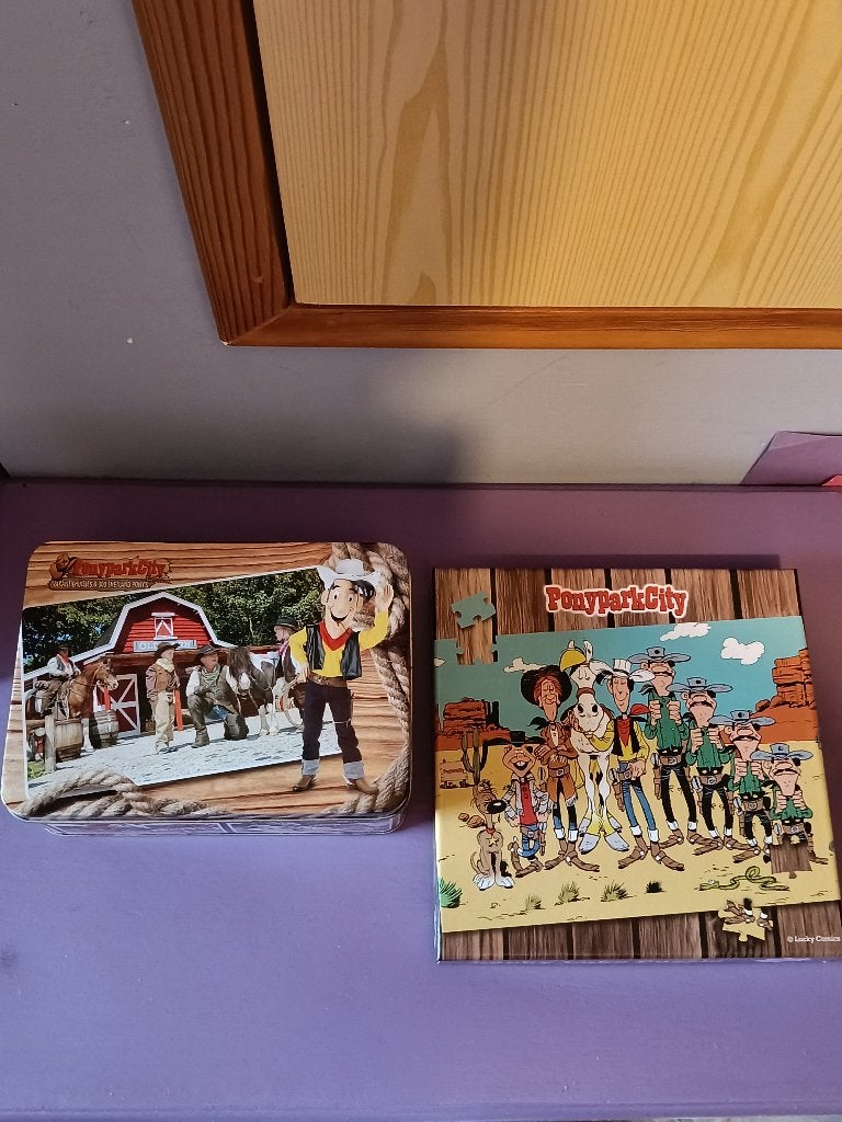 Lucky Luke: puzzel en blikken doos., Verzamelen, Stripfiguren, Ophalen of Verzenden, Overige figuren, Zo goed als nieuw