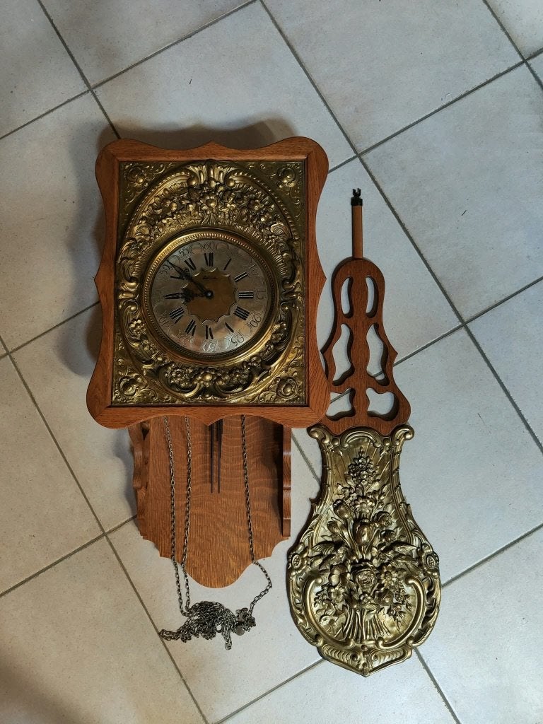 Antieke houten wandklok, Ophalen